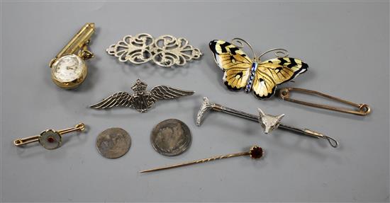 An early 20th century 930s and enamel butterfly brooch, garnet stick pin, two yellow metal bar brooches etc.